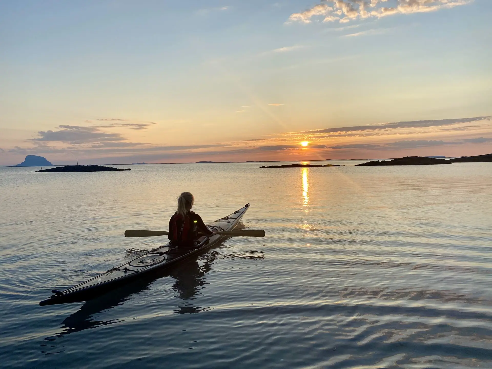 Kajakk i solnedgang
